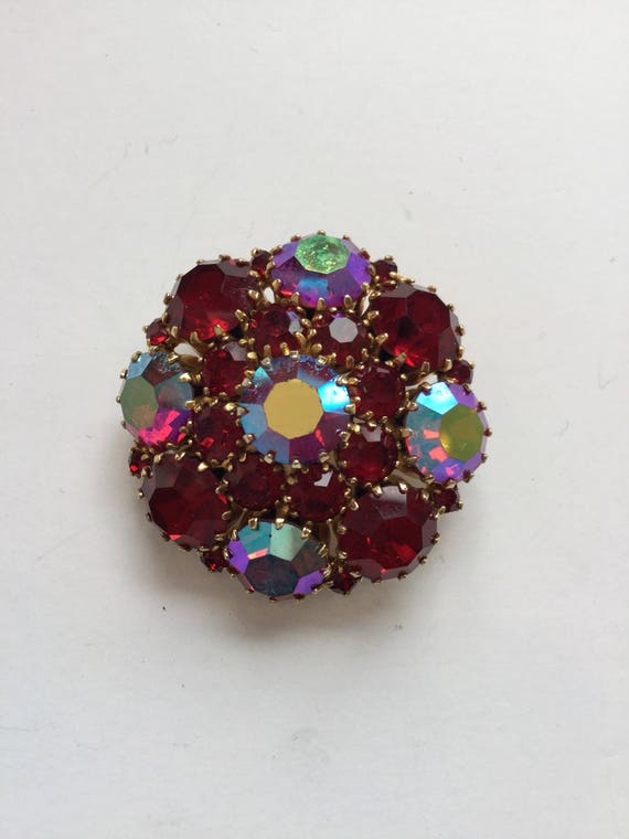 Weiss brooch | vintage round red iridescent rhines