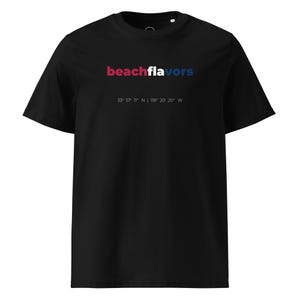 May include: A black short-sleeved t-shirt featuring the text "beachflavors" in red, white, and blue lettering across the chest. Below the text, the coordinates "33° 57' 11" N | 118° 20' 20" W" are printed in a small, thin white font.