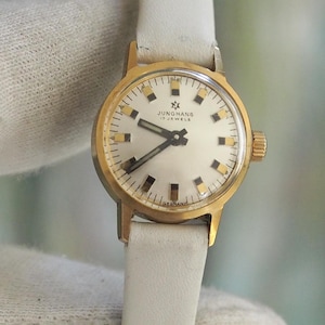 Vintage Junghans 17 Jewels Wind-Up Watch – 20 mm Gold-Tone Case – White Strap – Fully Working