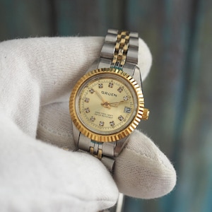 Vintage Gruen Oyster Quartz Watch – 26 mm Two-Tone Steel & Gold, Diamond like Dial, Date Display, New Battery, Working