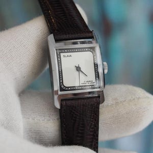 Orologio meccanico vintage Slava da donna - prodotto in URSS, 17 rubini, cassa da 21 mm, mai indossato e in perfette condizioni.