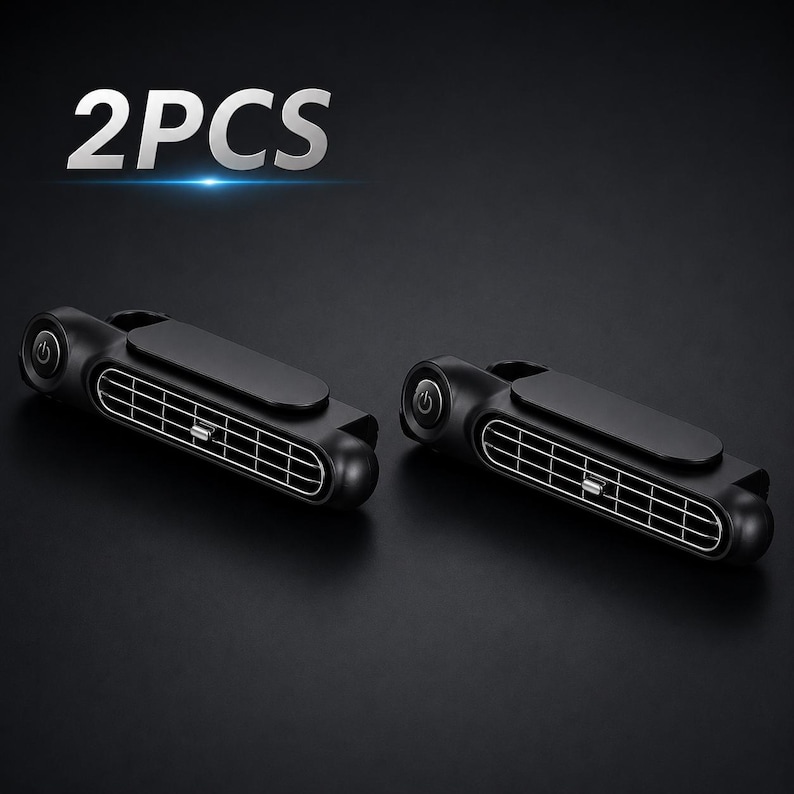 Puede incluir: Dos ventiladores de coche negros de forma rectangular con un dise&ntilde;o de rejilla horizontal y un bot&oacute;n de encendido circular en el lateral. El texto 2PCS aparece en blanco en la parte superior de la imagen, indicando un conjunto de dos unidades.
