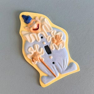 Plaque d'interrupteur clown en céramique vintage Lane & Co des années 1950 – Décoration cirque rétro