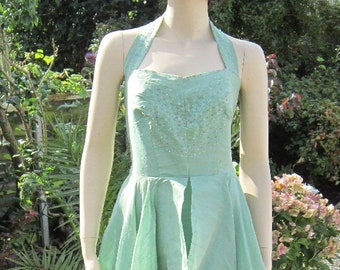 Vintage 50s Nathans Jamaica green silk evening dress with halter neck, sequins and bolero jacket