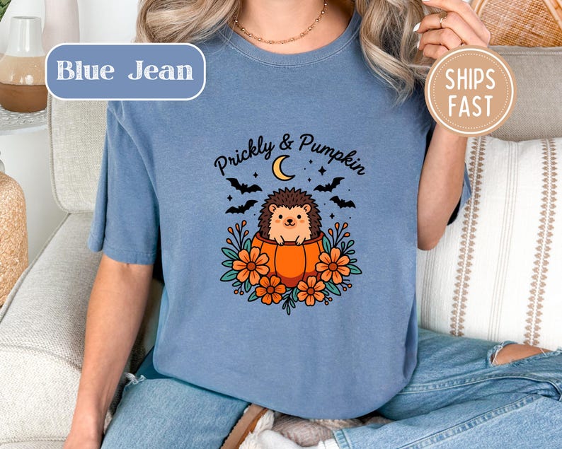Blue t-shirt with "Prickly & Pumpkin" text and a hedgehog in a pumpkin.