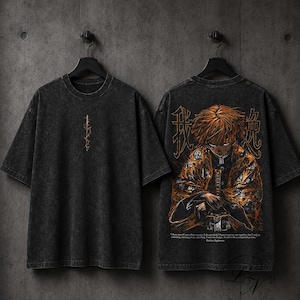 May include: A charcoal grey acid-wash t-shirt featuring a small vertical sword graphic on the front and a large, detailed illustration of an anime character with blonde hair in a patterned orange robe on the back, accompanied by Japanese text.