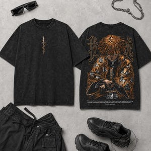 May include: A black acid-wash t-shirt featuring a small vertical graphic on the front and a large anime character illustration on the back with Japanese text. The set includes black cargo trousers, black trainers, sunglasses, and a silver chain necklace.
