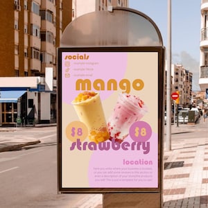May include: A vertical advertisement poster featuring two plastic cups of fruit smoothies, one yellow mango and one pink strawberry, with the text 'socials', 'mango', 'strawberry', and 'location' displayed against a light pink and beige background.
