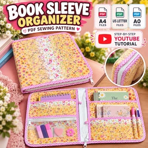 May include: A fabric book sleeve organizer featuring a yellow floral pattern with pink gingham trim. The interior includes multiple pockets, a zippered compartment, and elastic loops holding stationery items like pens and notebooks.