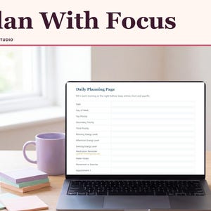 May include: A laptop screen displays a Daily Planning Page template with fields for date, priorities, energy levels, and tasks. The text Plan With Focus and Ankora Studio appears above. A purple mug and pastel sticky notes sit on the desk.