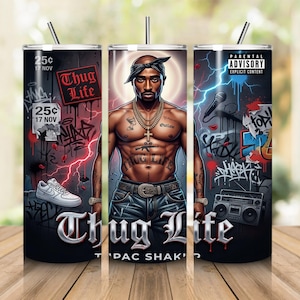May include: A cylindrical tumbler featuring a graphic of Tupac Shakur with a bandana, gold chains, and tattoos. The design includes graffiti, a boombox, a white sneaker, a Parental Advisory label, and the text Thug Life and 25 cents 17 Nov.