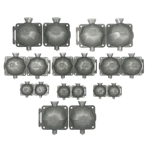 May include: A set of 14 gray metal molds for making ice cubes. The molds are shaped like a geometric diamond with a pointed top. The molds are arranged in rows and columns. The text "Made in the USA" and "FC P003" is printed on the molds.