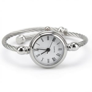 May include: A silver-toned quartz watch featuring a round white face with black Roman numerals and thin black hands. The watch band is constructed from a twisted metal cable design, finished with polished spherical end caps on each side.