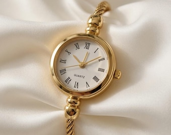 Montre Bracelet Câble Doré Élégante avec Chiffres Romains - Montre Quartz Femme