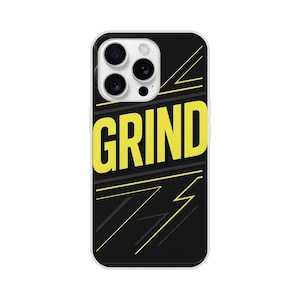 May include: A black smartphone case featuring the word GRIND in large yellow capital letters across the center. The design includes thin yellow and black diagonal lines and geometric accents, with a cutout for the triple camera lens array.