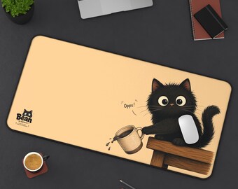 黒子猫がコーヒーをこぼすデスクマット｜かわいい猫のイラスト