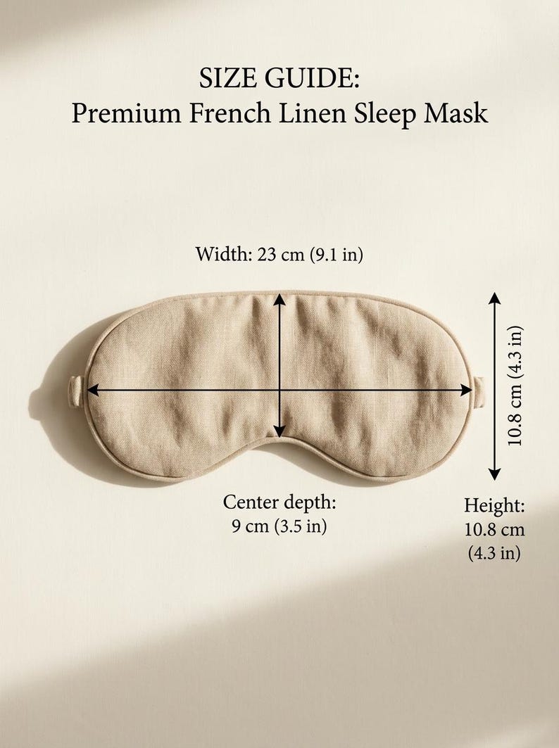 May include: A beige sleep mask with a size guide featuring the text: SIZE GUIDE: Premium French Linen Sleep Mask. The width is 9.1 inches, the height is 4.3 inches, and the center depth is 3.5 inches. The mask has a rounded, contoured shape.