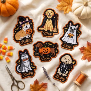 May include: Six embroidered Halloween-themed dog patches featuring Bella as a witch, Max as a vampire, Luna as a ghost, Coco in a pumpkin, Rocky with candy, and Daisy as a skeleton. Each patch includes a name tag and decorative stars and bats.