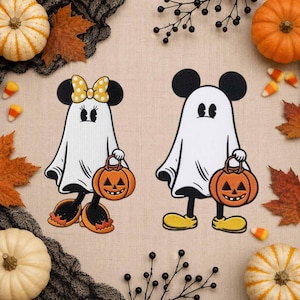 May include: Two embroidered patches featuring cartoon characters dressed as ghosts for Halloween. One character wears a yellow polka-dot bow and orange shoes, while the other wears yellow shoes. Both hold orange jack-o'-lantern candy buckets.