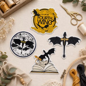 May include: Four embroidered patches featuring dragon motifs and text. One circular patch reads "FLY OR DIE FOURTH WING" in black on a yellow background. Other patches depict black dragons in flight, one over a book, one in a circle, and one standalone.