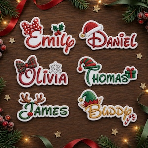 May include: Six embroidered name patches featuring festive holiday themes. The names Emily, Daniel, Olivia, Thomas, James, and Buddy are stitched in red, green, and gold thread, accented with icons like a polka dot bow, Santa hat, and reindeer antlers.