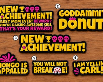 May include: Six embroidered patches with black borders and yellow text. Patch 1 reads NEW ACHIEVEMENT! BEST MOM EVER! REWARD? YOU'RE RAISING AWESOME KIDS, THAT'S YOUR REWARD! Patch 2 reads GODDAMMIT, DONUT! Patch 3 reads NEW ACHIEVEMENT! Patch 4 reads MONGO IS APPALLED. Patch 5 reads YOU WILL NOT BREAK ME! with heart-patterned underwear. Patch 6 reads I AM YELLING CARL!