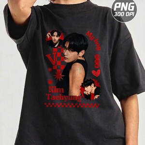 May include: A black short-sleeve t-shirt featuring a graphic print of Kim Taehyung. The design includes red text reading My boy and Kim Taehyung, a red checkered pattern, star shapes, a heart, and the numbers 30, 12, 95 in a red circle.