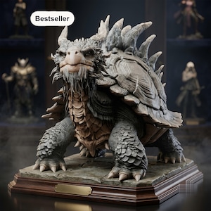 May include: A detailed dragon-turtle creature figurine with a textured, layered shell and sharp dorsal spikes. The creature has a scaly, grey and tan body, a beak-like mouth, and a beard-like feature. It stands on a stone-textured base with a wooden plinth.