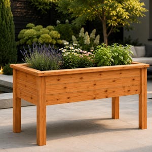 May include: A rectangular raised garden bed constructed from light brown wood with four sturdy legs. The planter is filled with a variety of green plants, including purple lavender, white daisies, and leafy green herbs, creating a vibrant display.