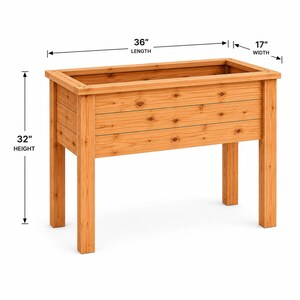 Pode incluir: Uma floreira retangular de madeira com quatro pernas, apresentando um acabamento de grão de madeira castanho claro natural. A floreira tem dimensões de 91,44 cm de comprimento, 43,18 cm de largura e 81,28 cm de altura indicadas na imagem.