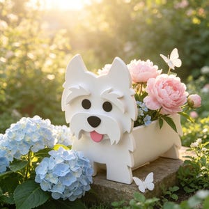 May include: A white West Highland Terrier shaped planter featuring black eyes, a black nose, and a pink tongue. The planter is filled with light pink peony flowers and is accented by two small white butterfly figures attached to the arrangement.