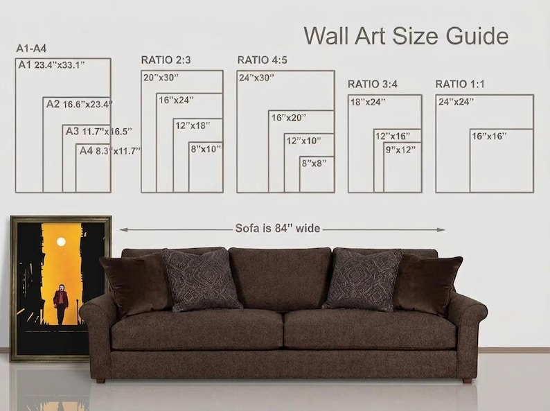 May include: A wall art size guide chart displaying various dimensions in inches, including A1-A4, ratios 2:3, 4:5, 3:4, and 1:1. Below the chart, a brown sofa is shown with a label indicating it is 84 inches wide, next to a framed poster.