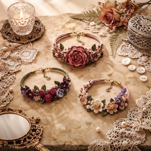 May include: Three handcrafted crochet bracelets featuring floral and berry motifs. One bracelet displays a large central rose, another showcases purple berries and flowers, and the third features assorted pastel blossoms and small white pearls.