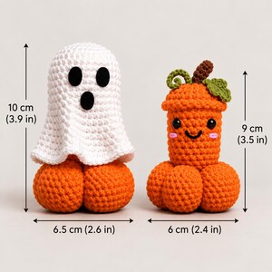 May include: Two crocheted figures: a white ghost sitting on an orange pumpkin base measuring 3.9 inches tall and 2.6 inches wide, and an orange pumpkin figure with a green stem and leaf measuring 3.5 inches tall and 2.4 inches wide.