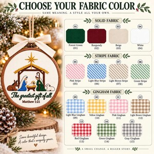 May include: A round wooden embroidery hoop ornament featuring a nativity scene with a gold star, figures, and the text 'The greatest gift of all Matthew 1:21'. A color chart displays fifteen fabric options including solid, striped, and gingham patterns.