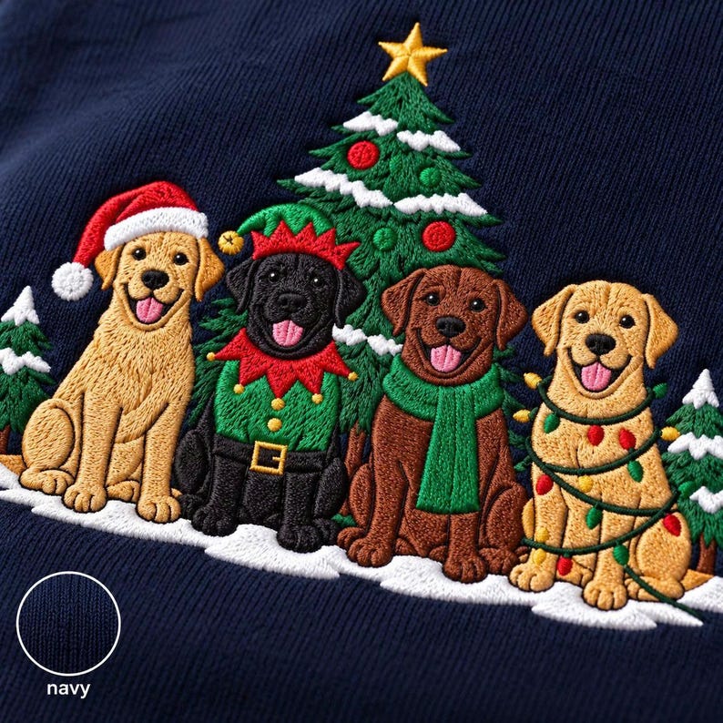 May include: A navy blue sweatshirt featuring an embroidered design of four dogs sitting in front of a Christmas tree. One dog wears a Santa hat, one is dressed as an elf, one wears a green scarf, and one is wrapped in colorful holiday lights.