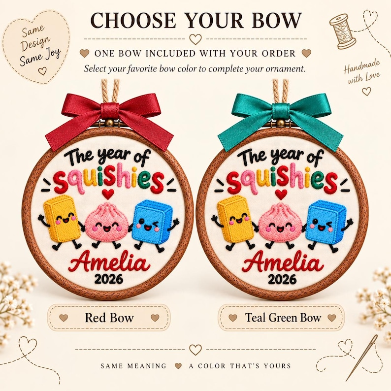 May include: Two circular wooden embroidery hoops featuring embroidered text The year of squishies and Amelia 2026 with three cartoon characters. One hoop has a red satin bow and the other has a teal green satin bow, both with hanging twine.