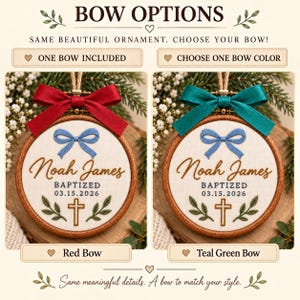 May include: A round embroidery hoop ornament featuring the embroidered name Noah James, the text BAPTIZED 03.15.2026, a blue bow, a gold cross, and green leaves. The ornament is shown with two bow options: a red satin bow or a teal green satin bow.