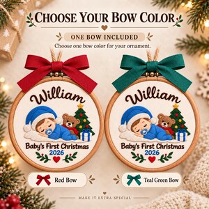 May include: Two round wooden embroidery hoop ornaments featuring a sleeping baby in a blue outfit with a teddy bear, Christmas tree, and gift. Text reads William, Baby's First Christmas 2026. One has a red bow, the other a teal green bow.