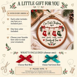 May include: A round wooden embroidery hoop ornament featuring embroidered text Our First Christmas as a Family of Four 2026. It displays four hanging stockings labeled Daddy, Mummy, Freddie, and Humphrey, topped with a cream-colored fabric bow.