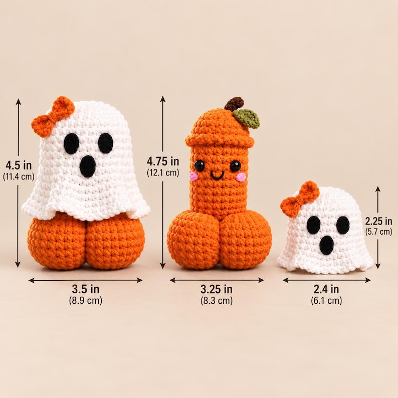May include: Three crocheted figures: a white ghost with an orange bow measuring 4.5 inches tall and 3.5 inches wide, an orange phallic figure with a green leaf measuring 4.75 inches tall and 3.25 inches wide, and a small white ghost with an orange bow.