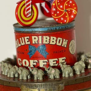 Trunk Show  - Wind-Up Tin Elephant Circus Figure on Vintage Blue Ribbon Coffee & Allen’s Toffee Tin