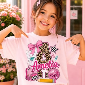 Camiseta infantil personalizada com inicial de leopardo, camiseta feminina personalizada com nome para volta às aulas, mochila com laço Coquette, presente para estudante