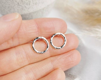 Silver hollow pebble stud earrings. Hammered Silver circle studs. Dainty, minimal style everyday earrings. Orbit Collection