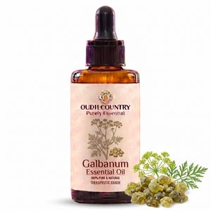 May include: An amber glass bottle with a black dropper cap containing Galbanum Essential Oil. The label features the text OUDH COUNTRY Purely Essential, Galbanum Essential Oil, 100% PURE & NATURAL THERAPEUTIC GRADE, with a botanical illustration.