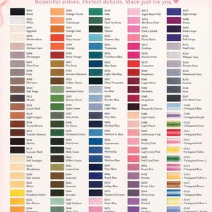 May include: An embroidery thread color chart titled Ruffles and Bows featuring a grid of over 120 color swatches with corresponding codes and names. The chart displays a wide spectrum of solid and variegated thread colors on a light background.