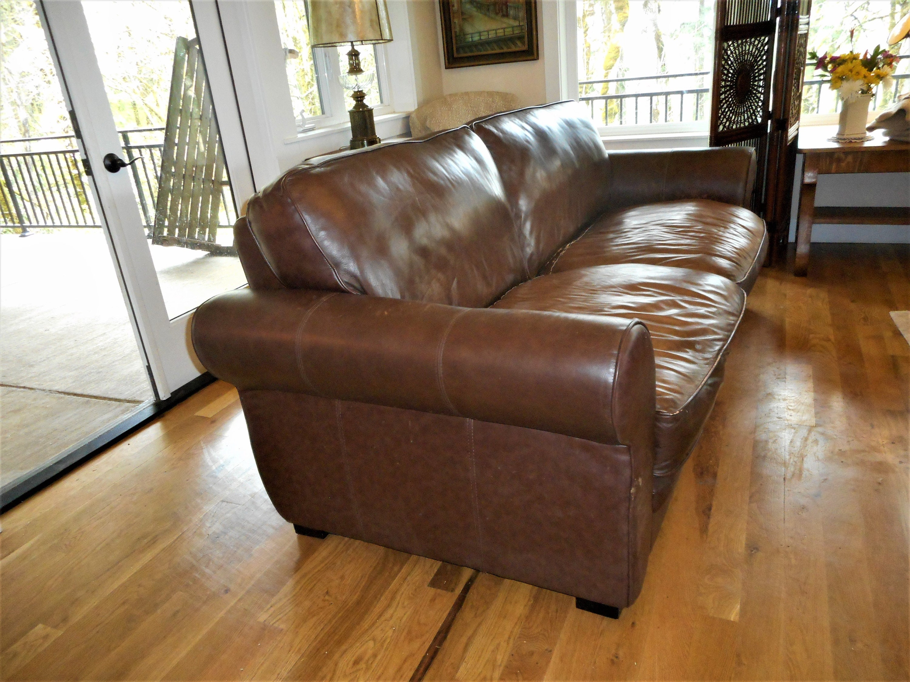 Brandon distressed whiskey italian 2024 leather sofa and loveseat