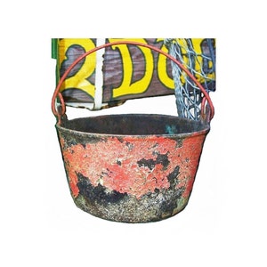 May include: A red metal bucket with a wire handle. The bucket is old and has chipped paint.