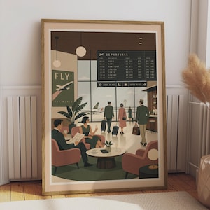 May include: A framed art print depicting a mid-century airport terminal scene. The illustration features a departures board, travellers with luggage, and a lounge area with chairs and a coffee table. A poster on the wall reads FLY THE WORLD.