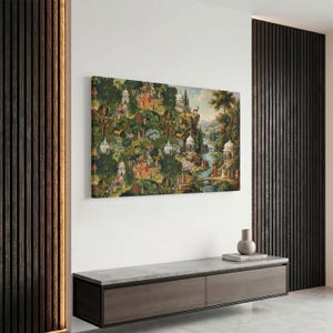 May include: A rectangular wall art print featuring a dense, lush landscape filled with numerous small figures in colorful traditional attire, white domed architectural structures, various trees, and a winding river flowing through a hilly terrain.